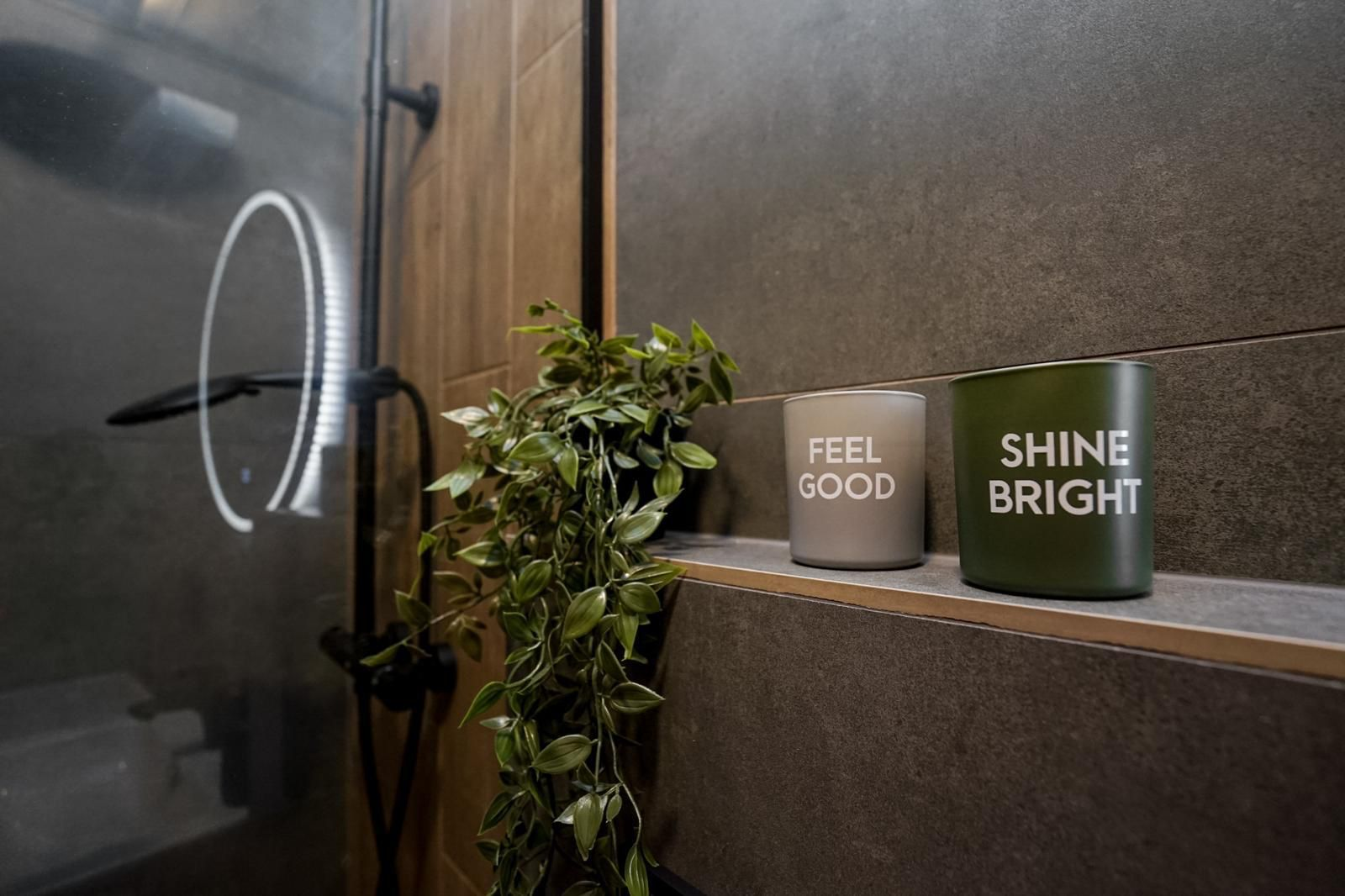Bathroom shelf with decorative candles